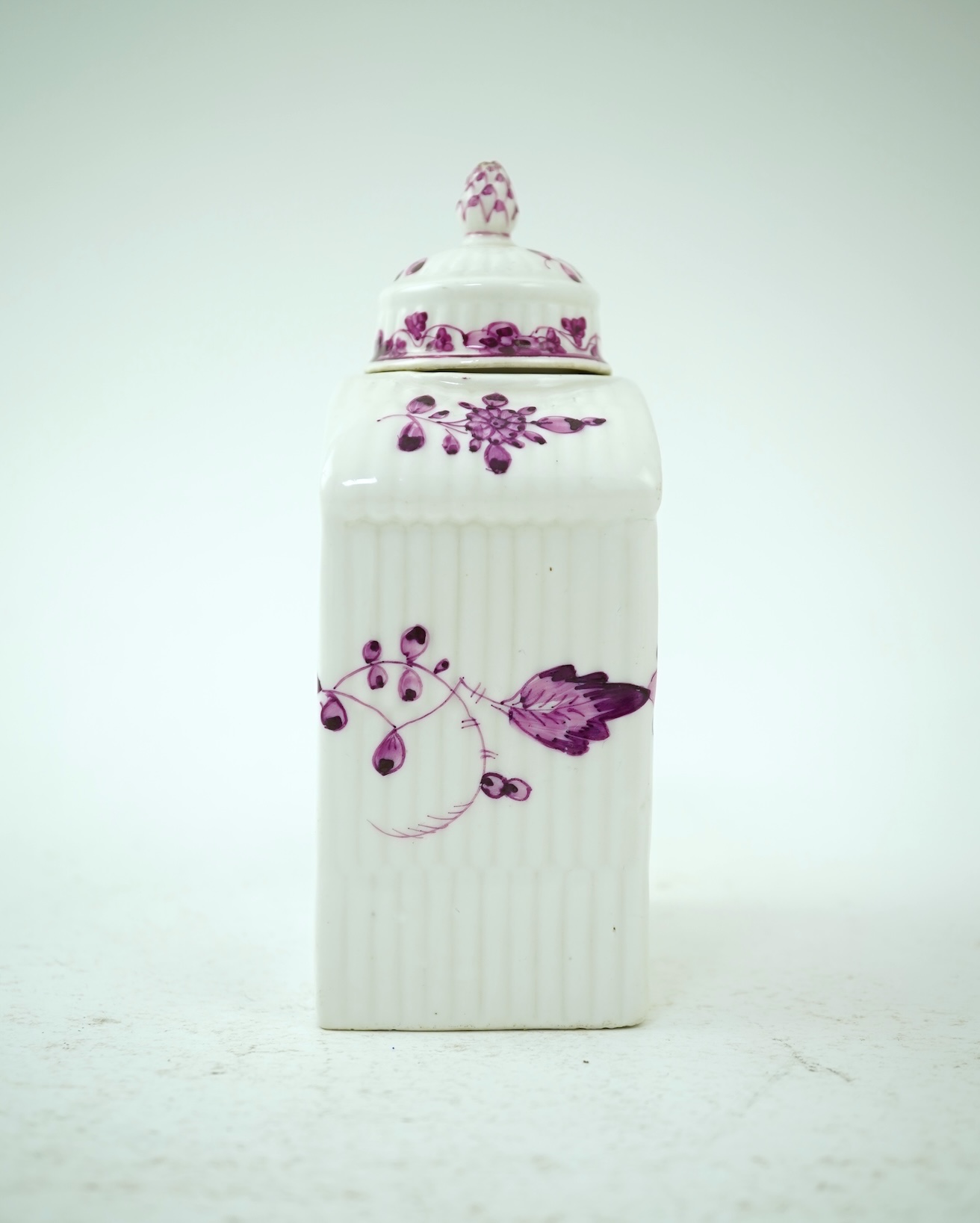 A Meissen puce painted tea caddy and cover, late 18th century